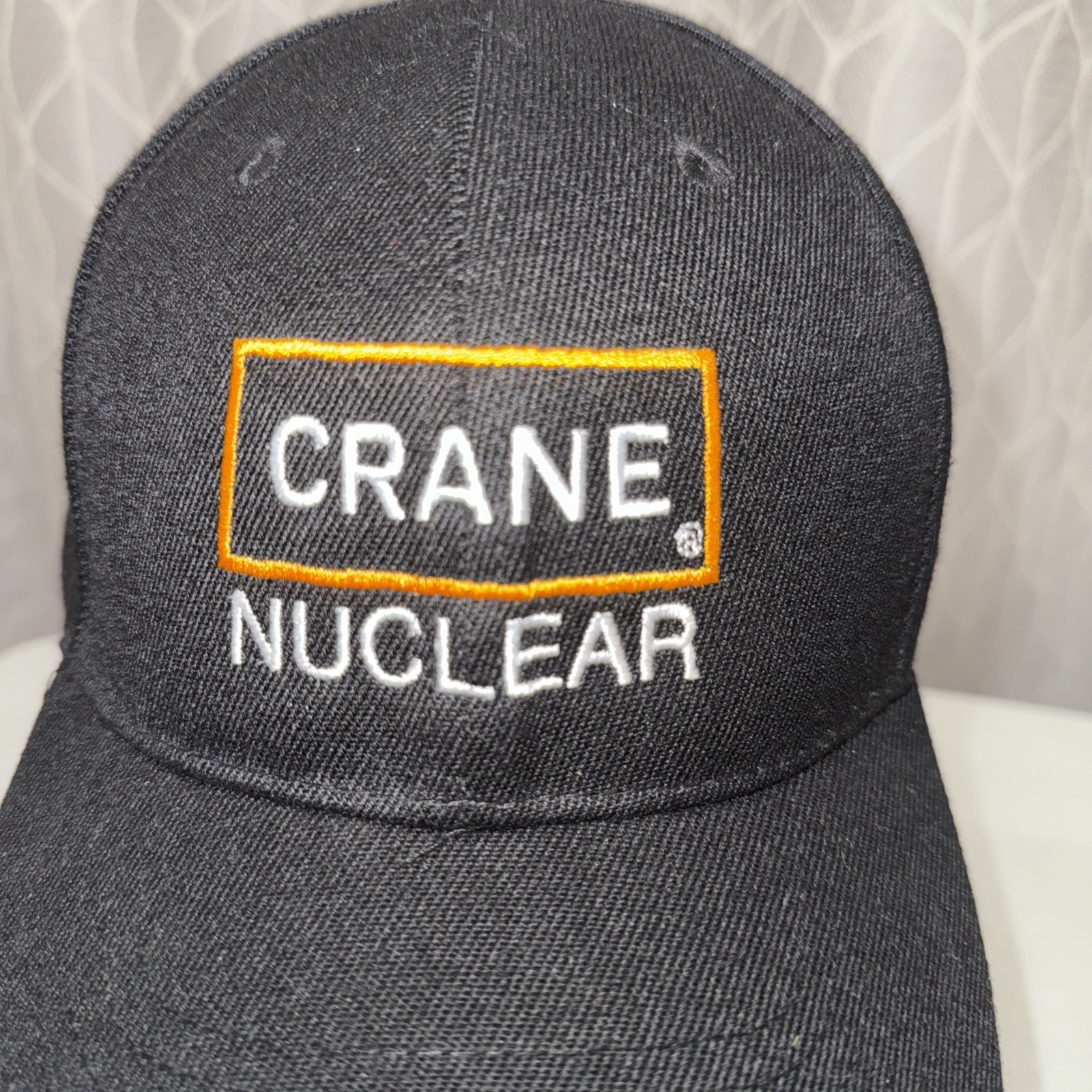 Crane Nuclear Black Hat Cap w Orange Rectangle and White Letters Hook Loop EUC