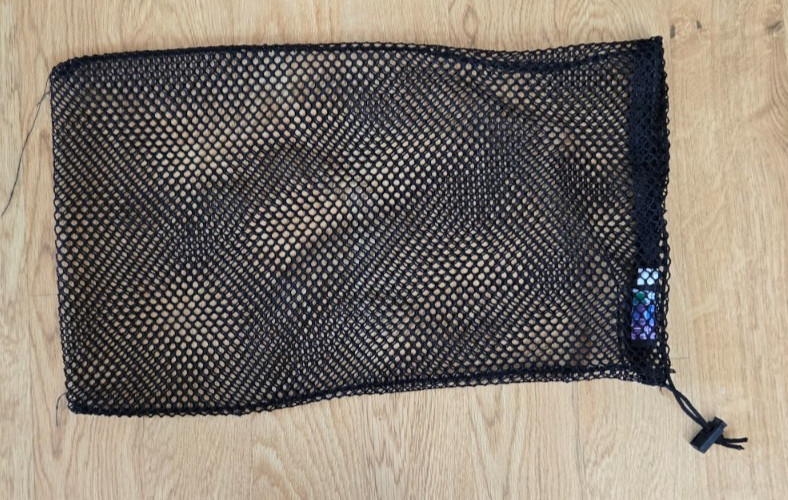 Campmor mesh storage bag, black, Laid flat: 23" x 14" wide; 8" diameter