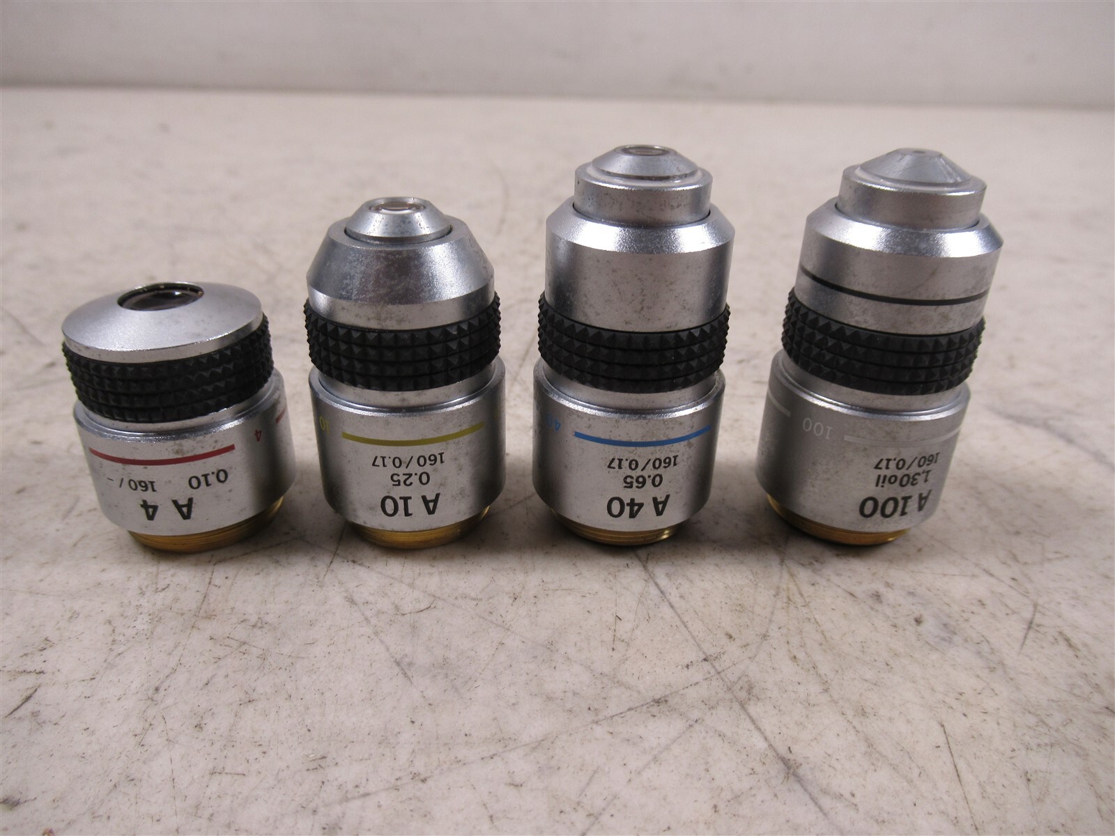 Lot of 4 Olympus Microscope Objective Lenses A100x A40x A10x and A4x For CH CHA