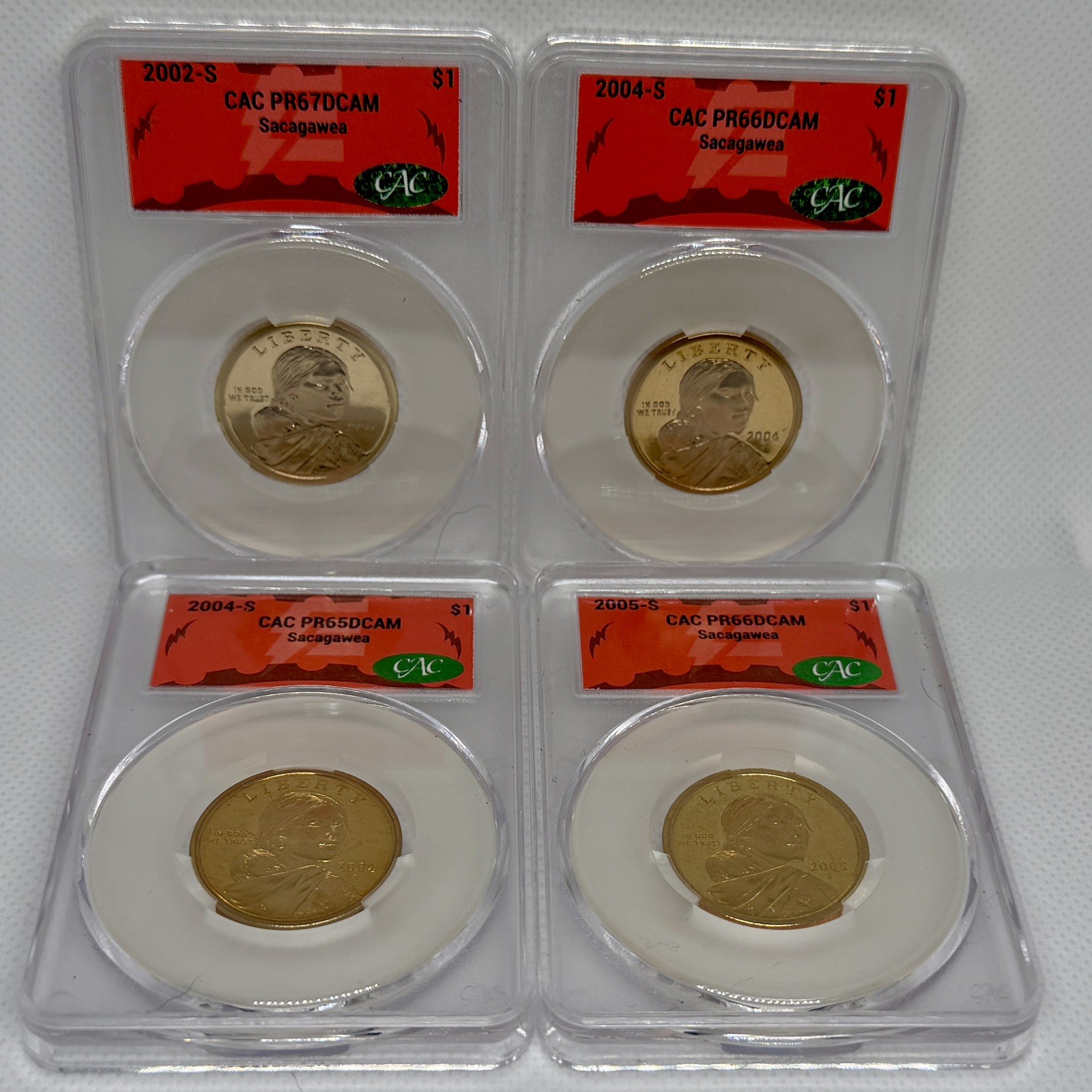 Lot 4 $1 CAC Sacagawea  DCAM 2002S PR67, 2004S PR66, 2004S PR65, 2005S PR66