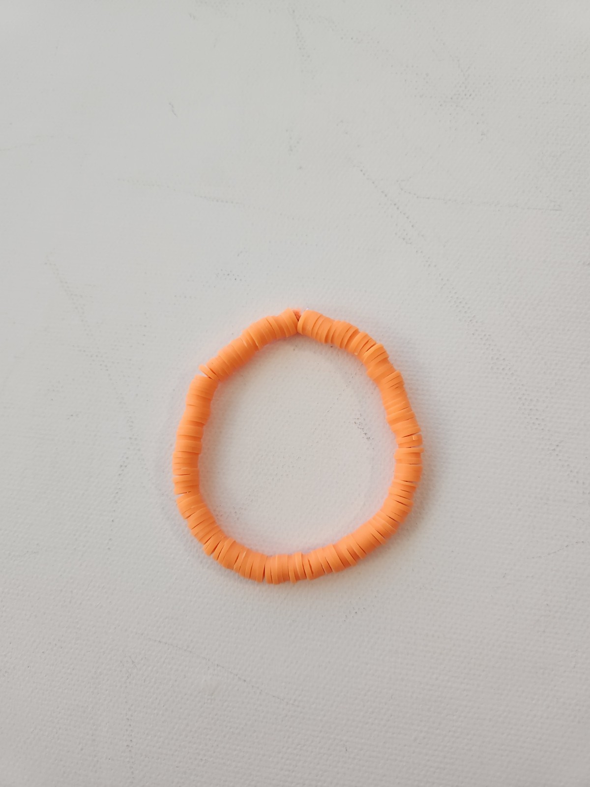 Handmade Orange Thin Clay Bead Stretchy Bracelet.