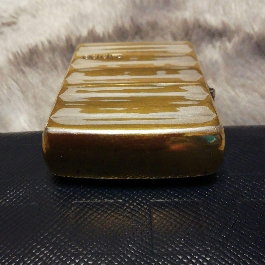 Zippo lighter, double-sided design, made in 2002.