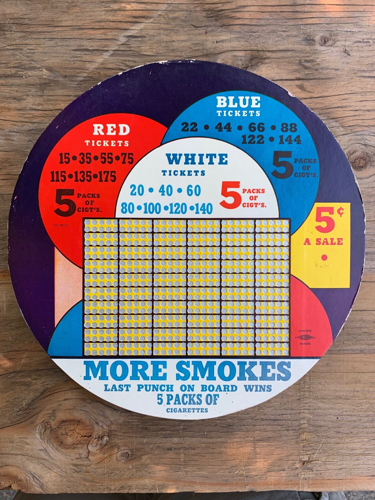 More Smokes Cig Punch Board. Unused Condition. L@@K Round