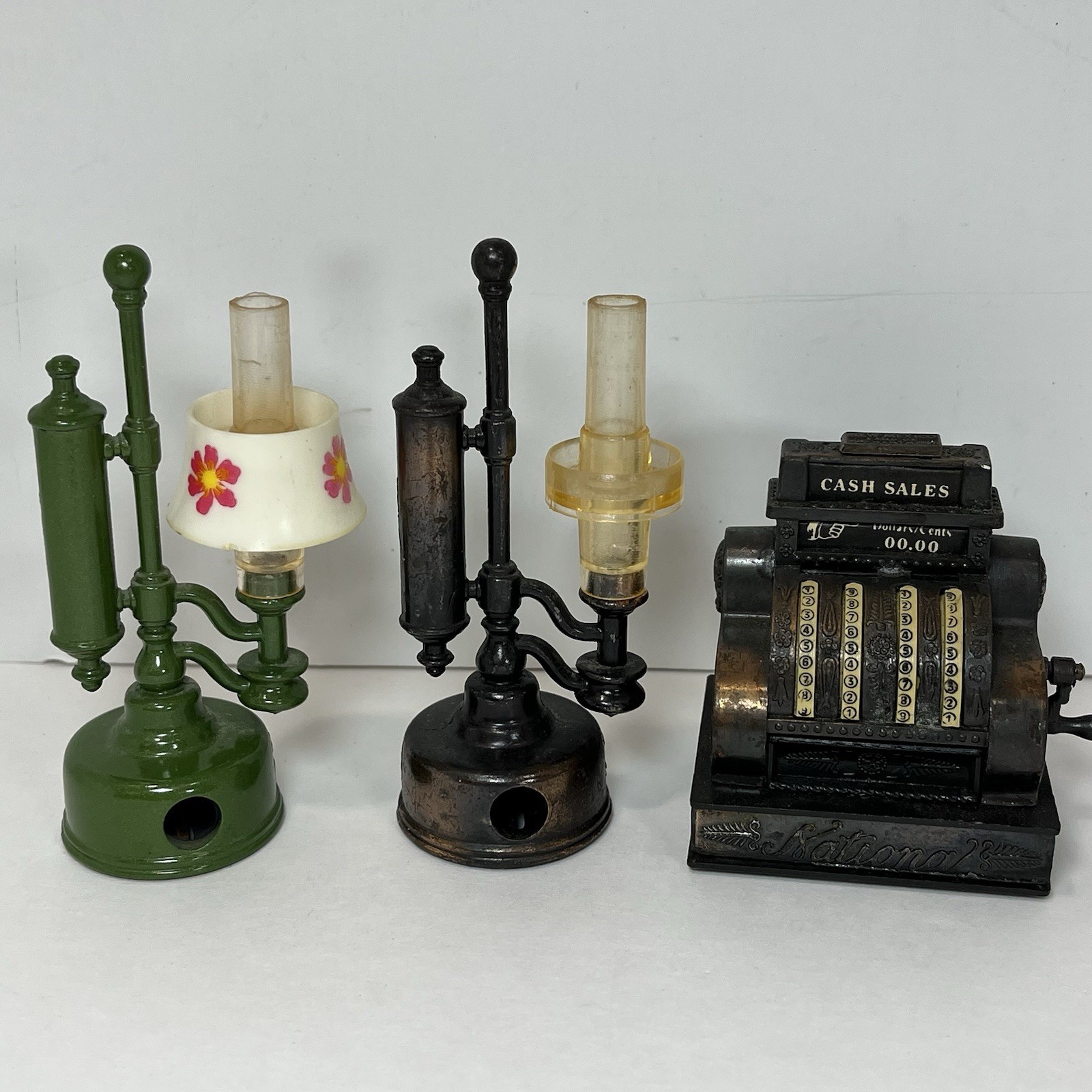 Vtg 3 Miniature Die Cast Metal Pencil Sharpeners Oil Lamps & Cash Register