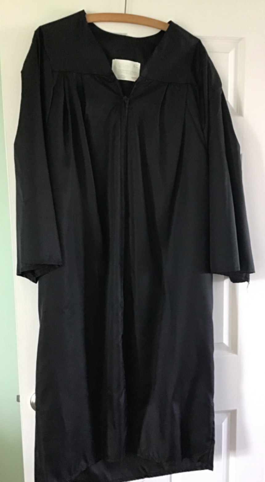Black graduation gown, size 5’07” to 5’09”, by Jostens