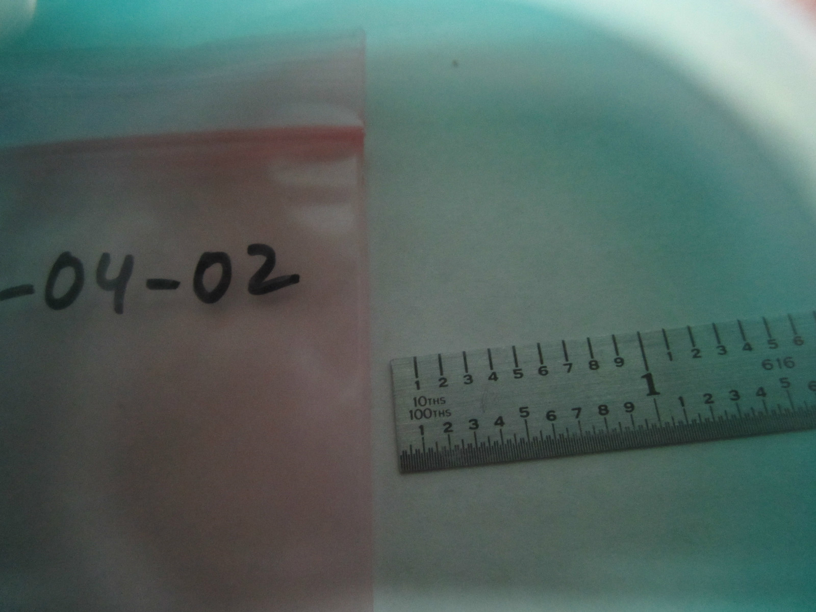 OPTICAL FILTER REMOVED FROM INSTRUMENT #1-04-02 LASER OPTICS BIN#1