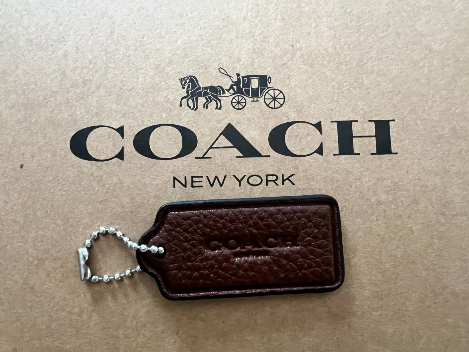 COACH Logo New York Hang Tag Charm Purse with Chain in Pebble Leather 2'' x 1"