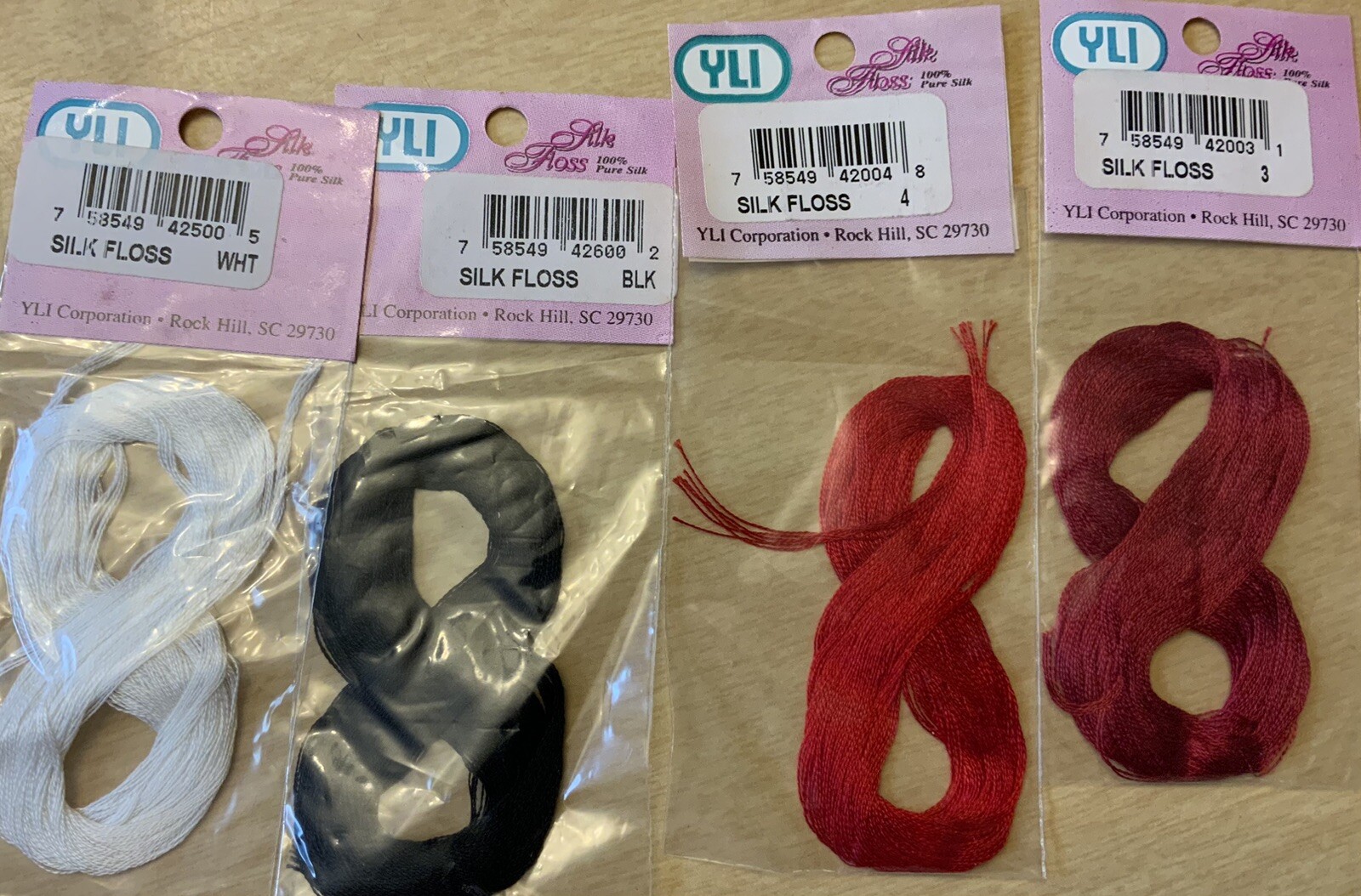 YLI Silk Floss Lot Of 4 Black, White, Red And Dark Red