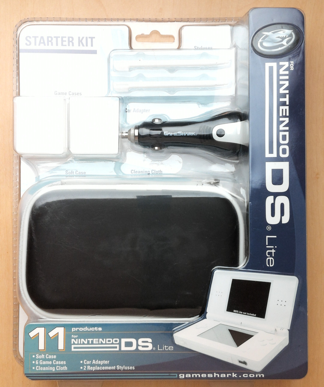 SEALED Nintendo DS Lite STARTER KIT 11-piece 6 game cases 2 styluses car adapter
