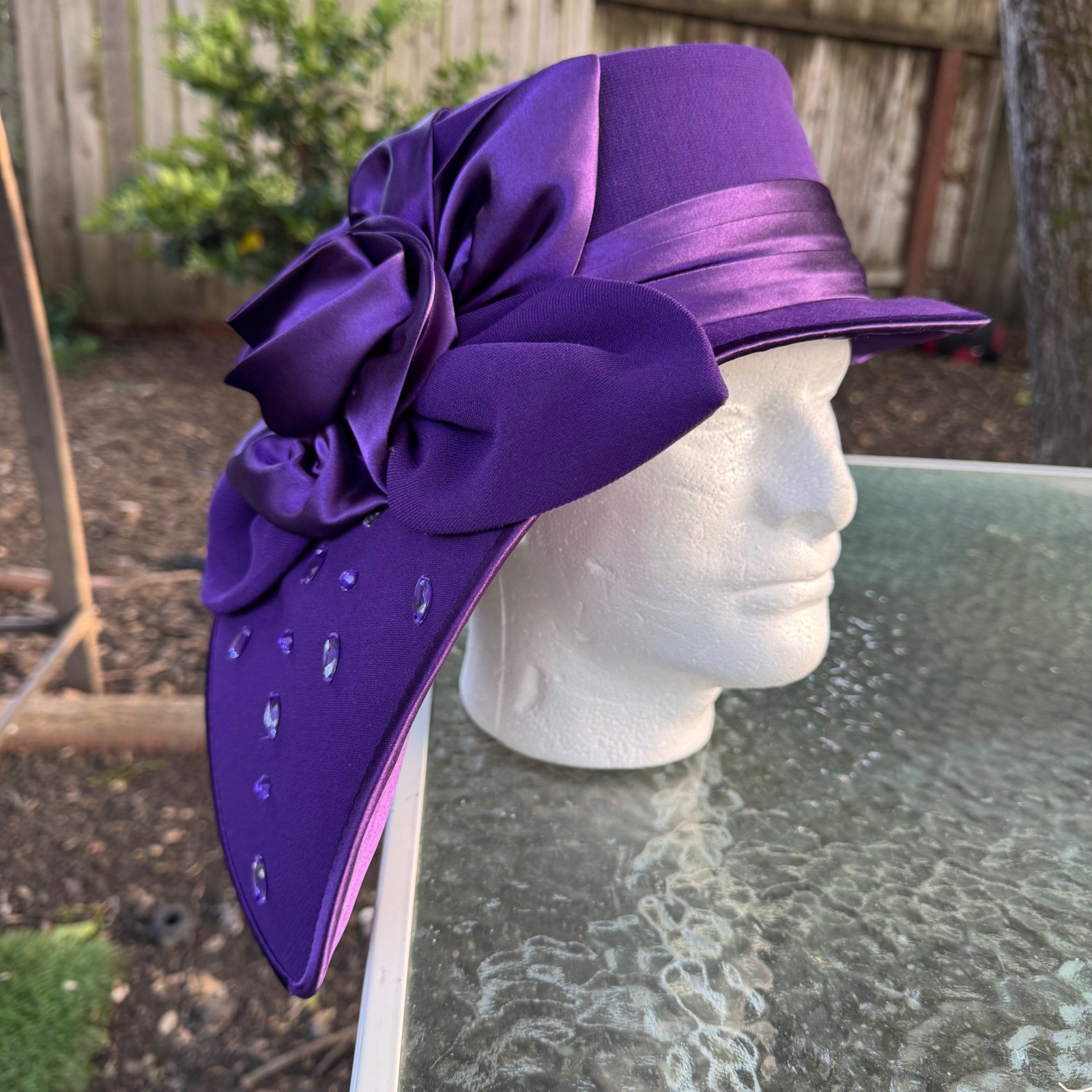 Nubiano New York Purple Church Derby Hat Satin Rosette Rhinestone Asymmetric