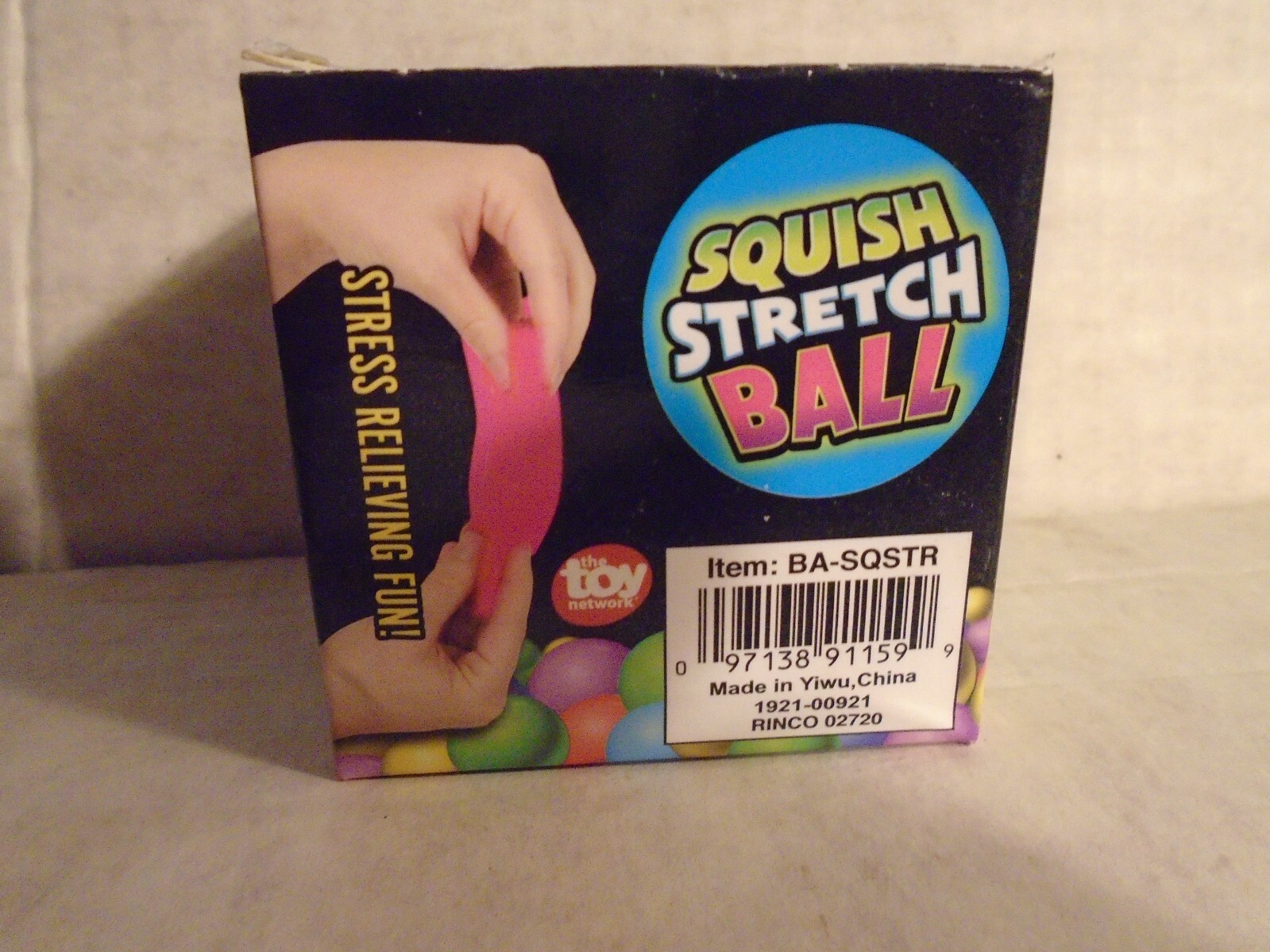 Squish Stretch Ball- Green stress relieving fun. In box, stretch/squeeze, squish