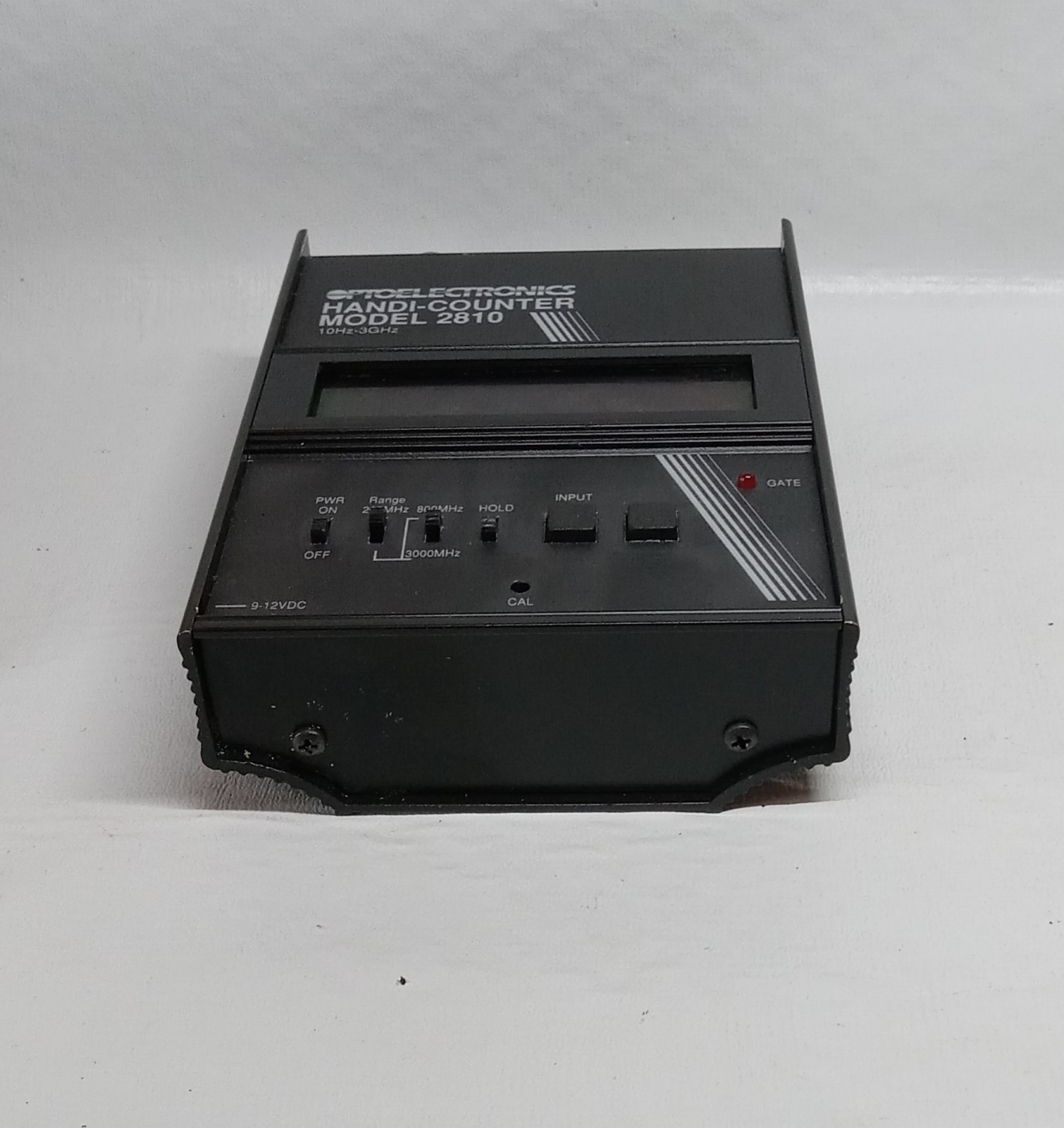 Optoelectronics Handi-Counter Model 2810 Portable Frequency Counter with Manual