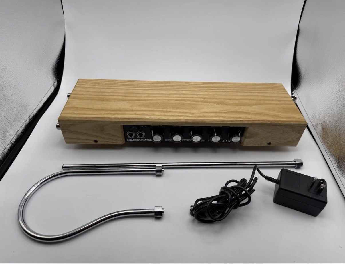 Moog Etherwave Plus Theremin with Carry Bag, power adapter, and training DvDs