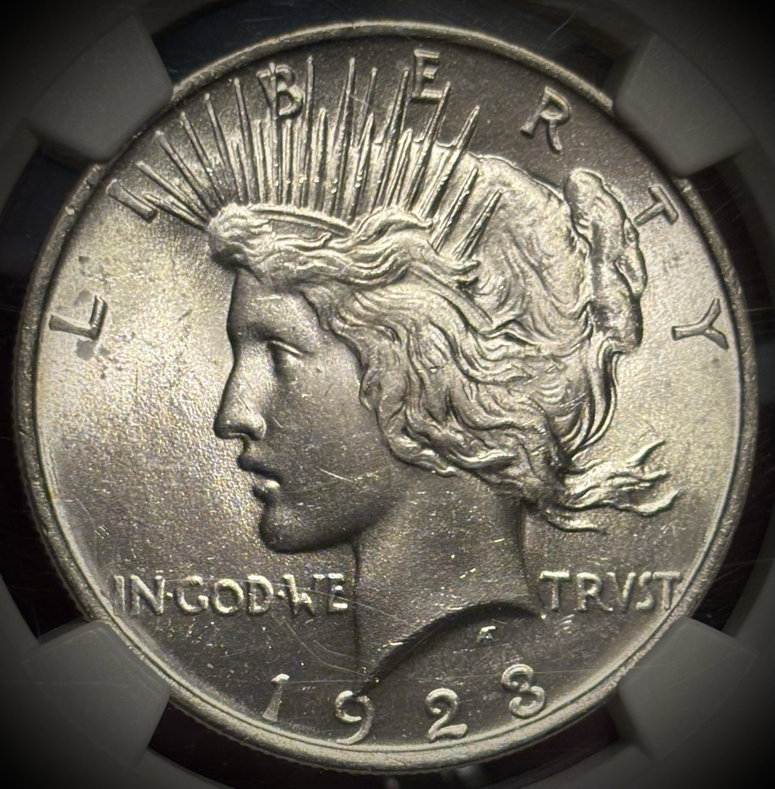 1923 Peace Dollar NGC MS63; Dripping with Luster