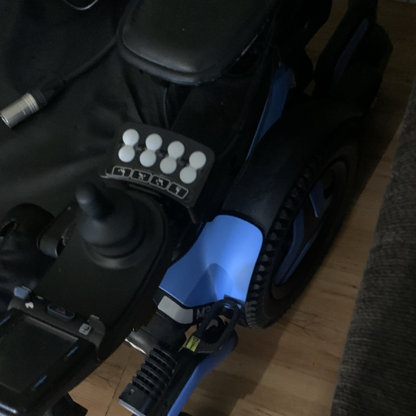 Quantum Electric Power Wheelchair Black and Blue Adjustable Footrests Ergonomic
