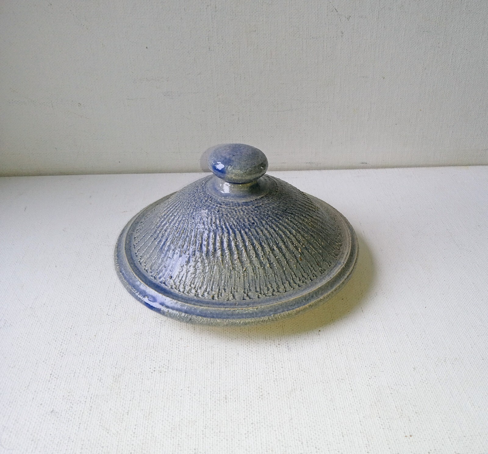 Bowring Ceramics Ginger Jar with lid. Light blue with impressed design.