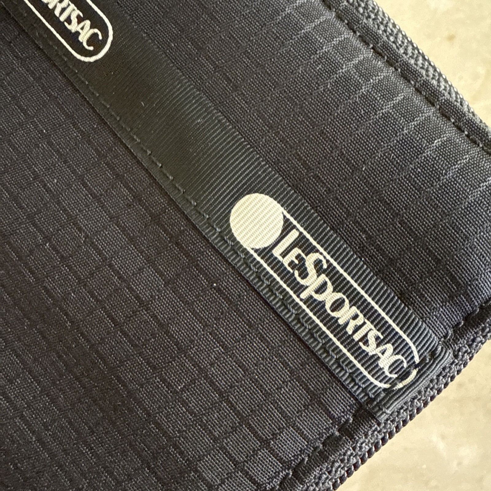 EUC LeSportsac ZIP AROUND ORGANIZER WALLET Black