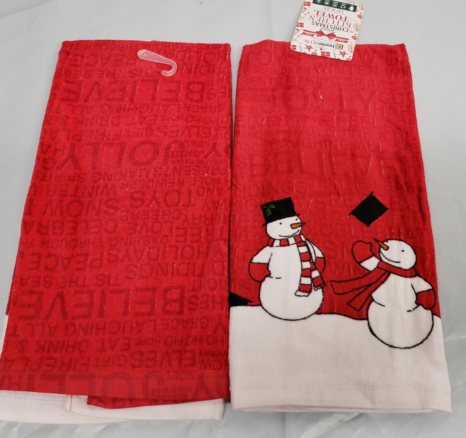 2 SAME PRINTED KITCHEN TERRY TOWELS(15"x25") 2 SNOWMEN ON RED CHRISTMAS WORDS,HS