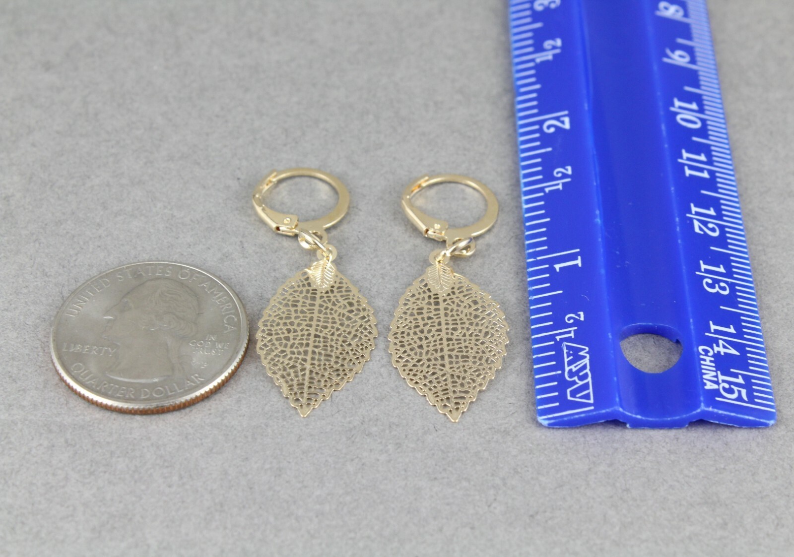 gold leaf earrings small filigree leaves dangle 1.75" long leverback lightweight