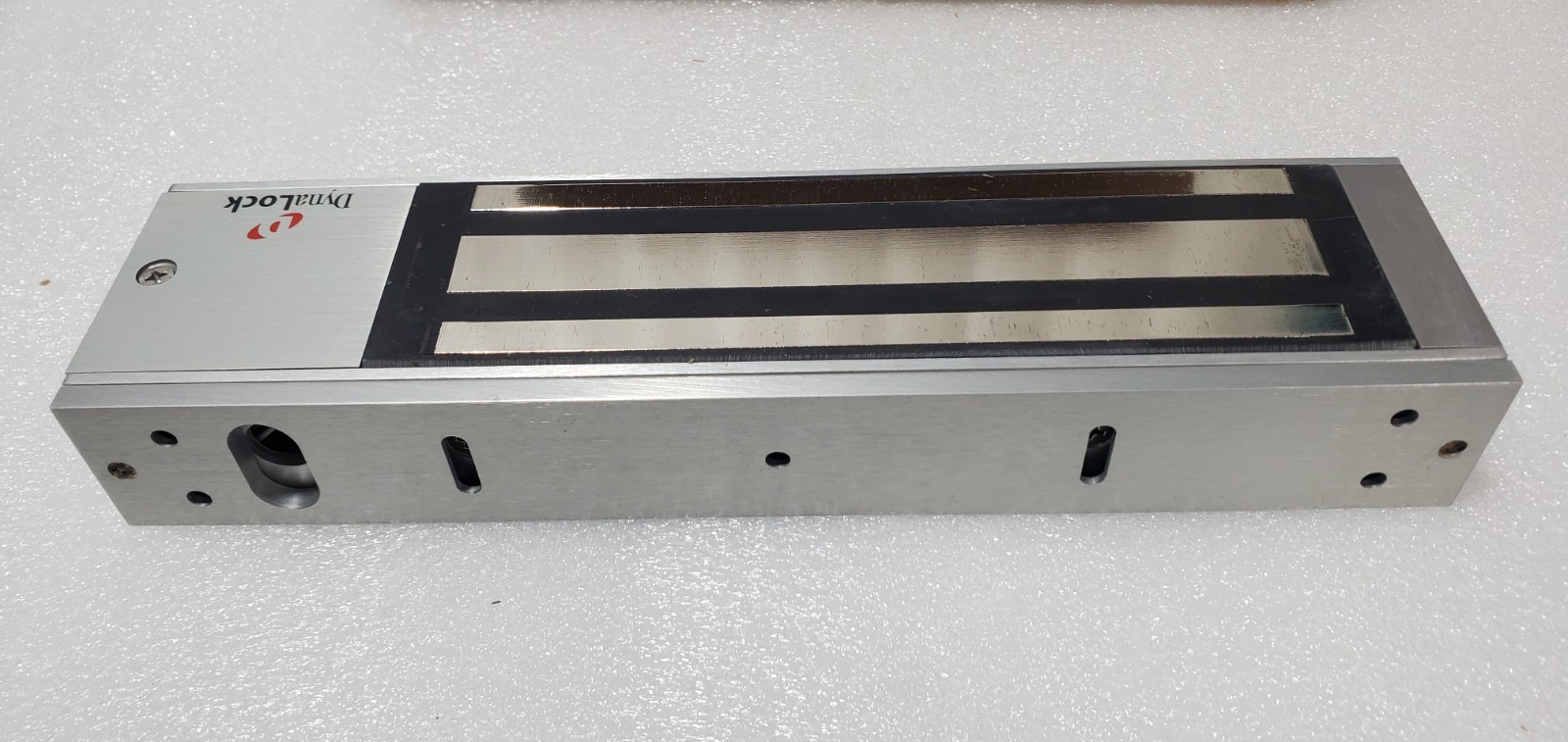 DynaLock 2011-US28-DSM Surface Mount Electromagnetic Lock 1200 LBS 12/24V NEW.