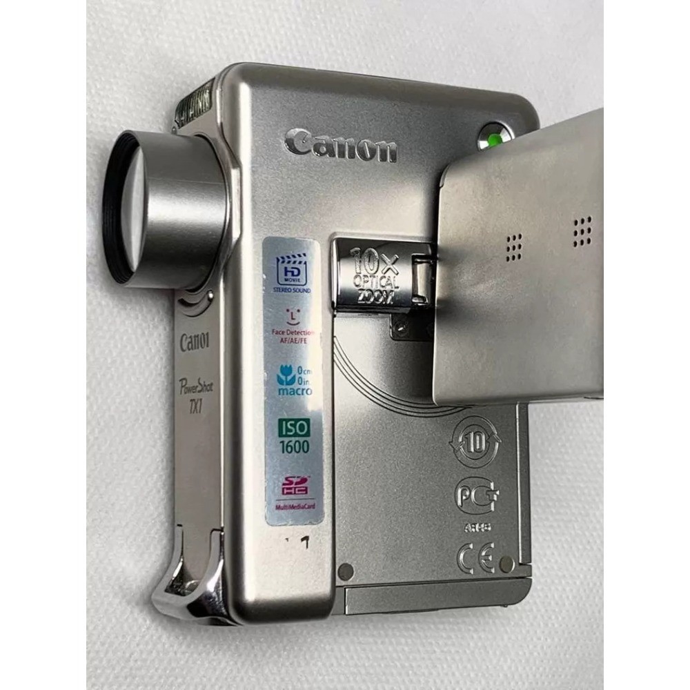 Canon PowerShot TX1 Digital Camera 7.1 MP 10x Optical Zoom Image Stabilization