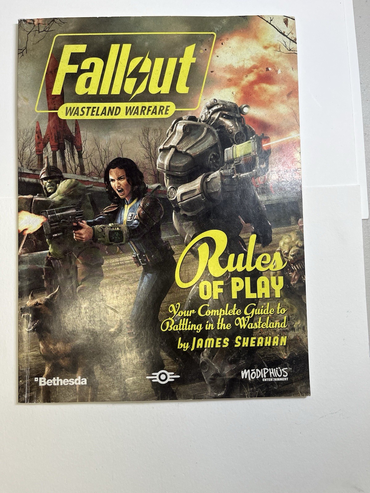 Fallout: Wasteland Warfare Rules of Play booklet.