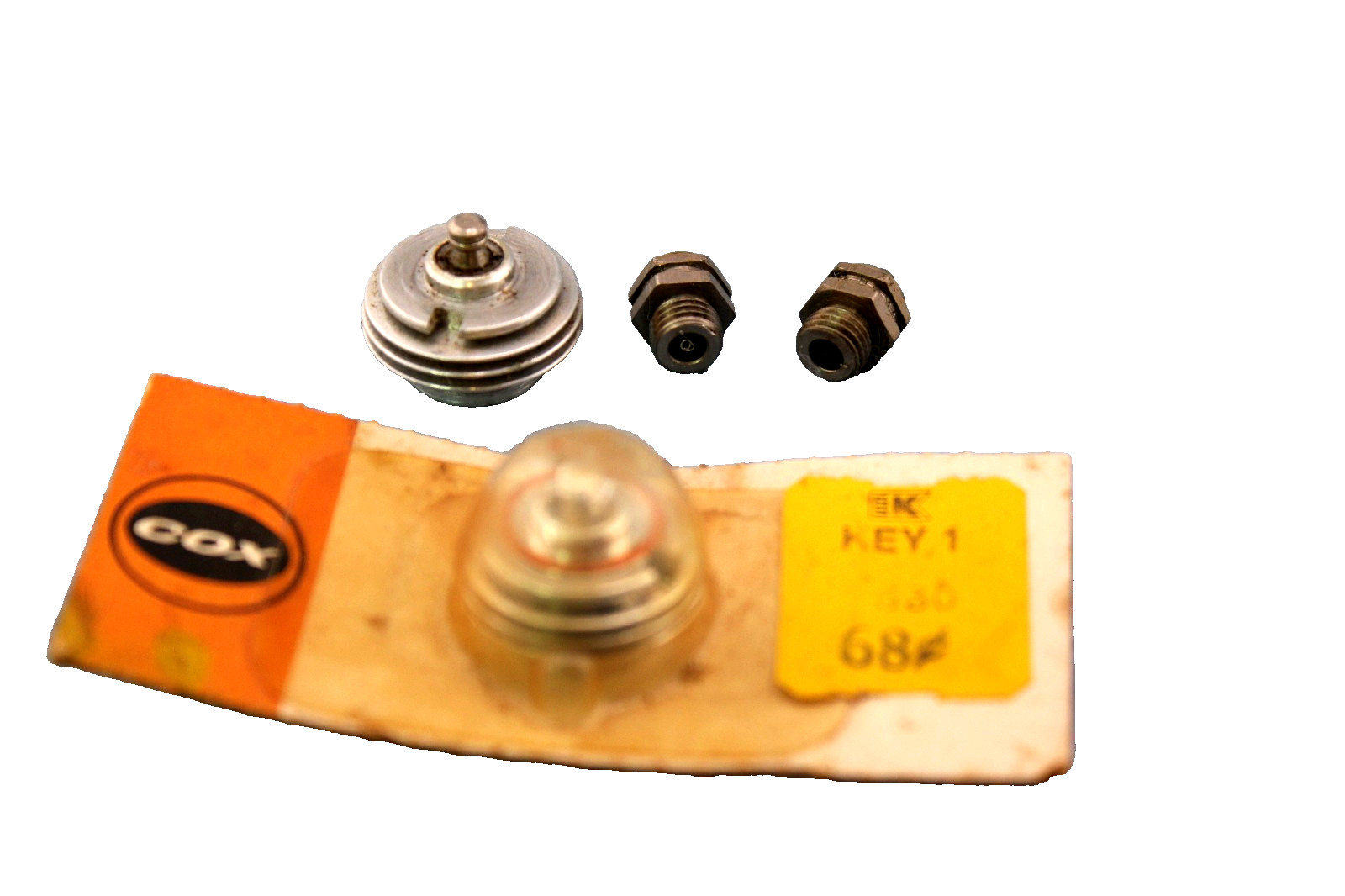 VINTAGE COX MODEL AIRPLANE MOTOR PARTS 2 CYLINDER HEADS, 2 GLOW PLUGS