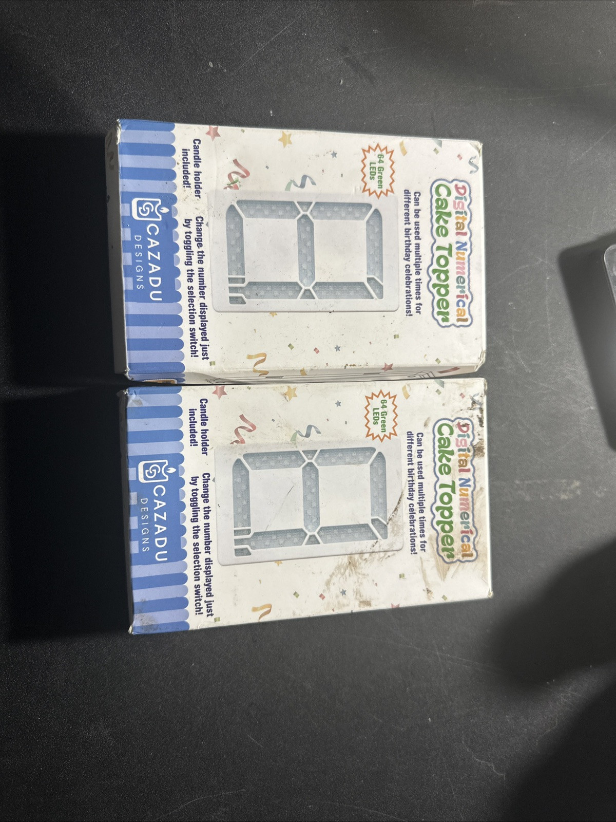Two battery powered digital numerical cake toppers candle holder included.