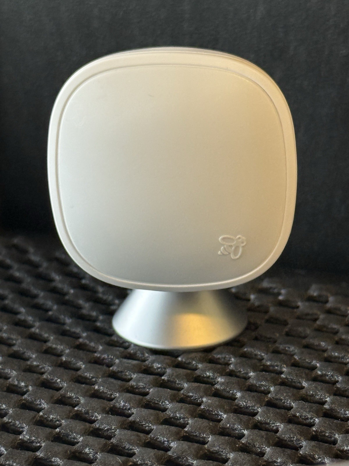 Ecobee SmartSensor Room Temperature Sensors, White, with a stand.