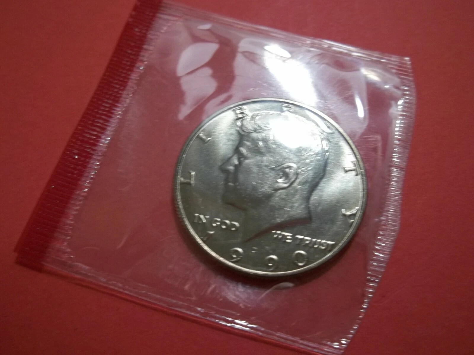 1990-D KENNEDY HALF DOLLAR IN IT'S ORIGINAL MINT CELLO