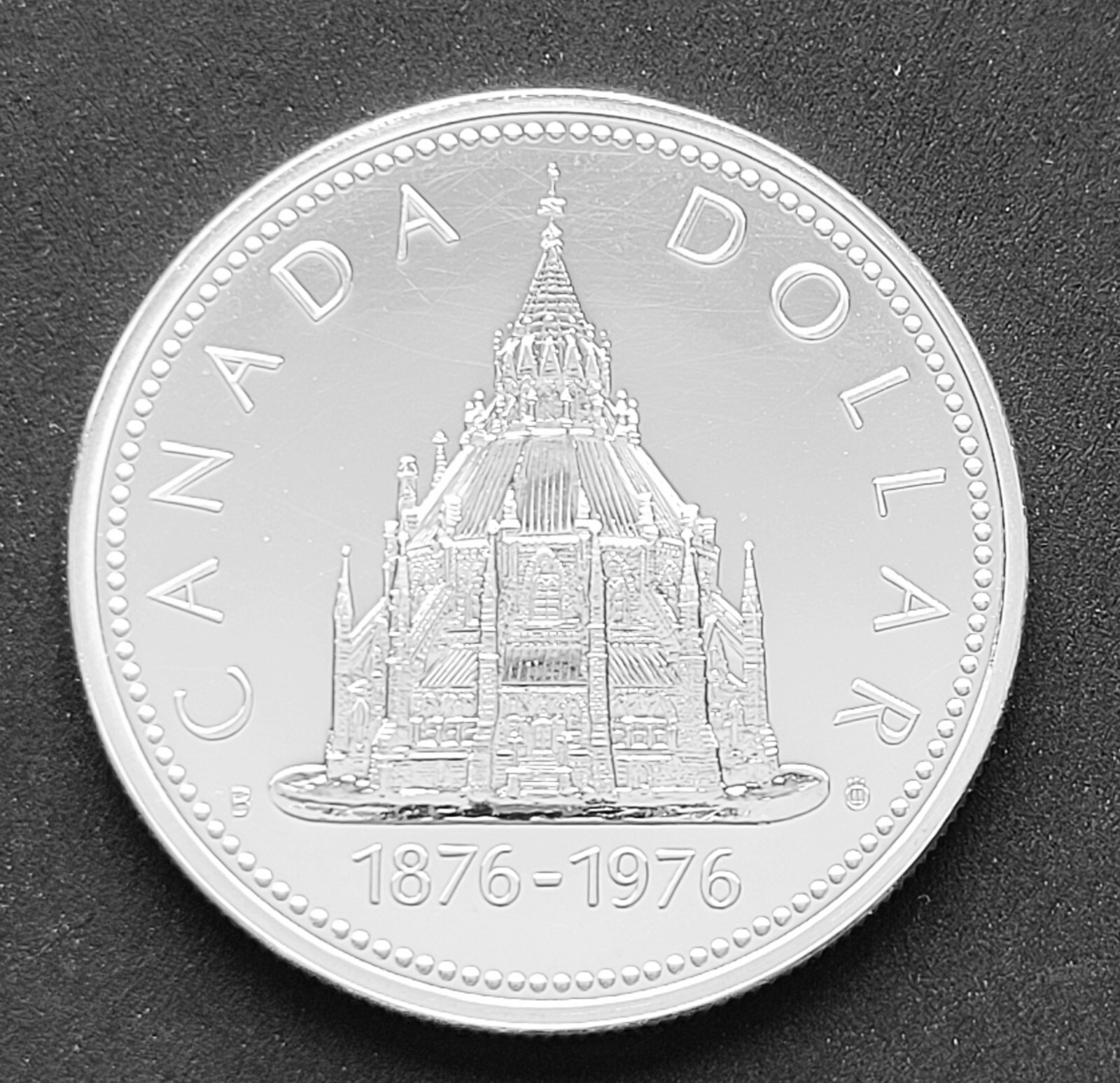*** CANADA  BRILLANT  SILVER  DOLLAR  1976  ***  PARLIAMENT  LIBRARY ***