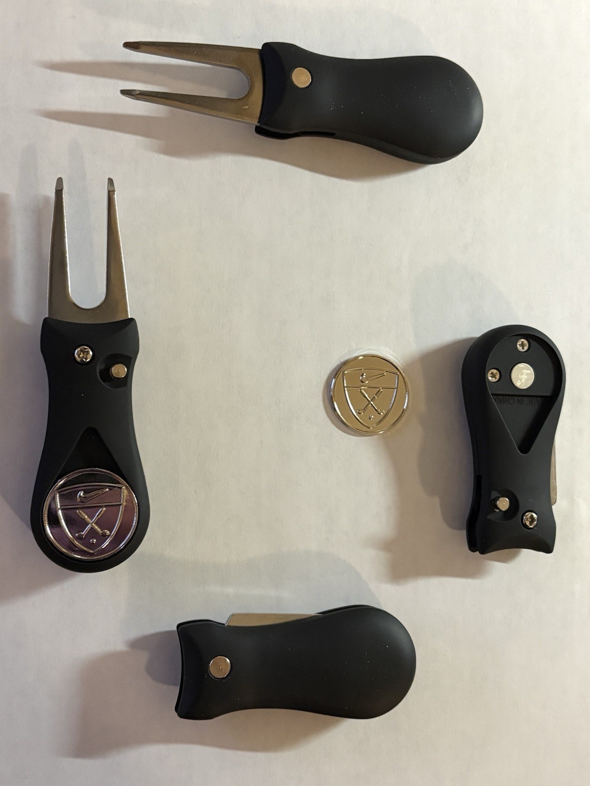 (1)  Switchblade Golf Divot Tool & (1) Nike Swoosh 1" Coin Style Golf Marker