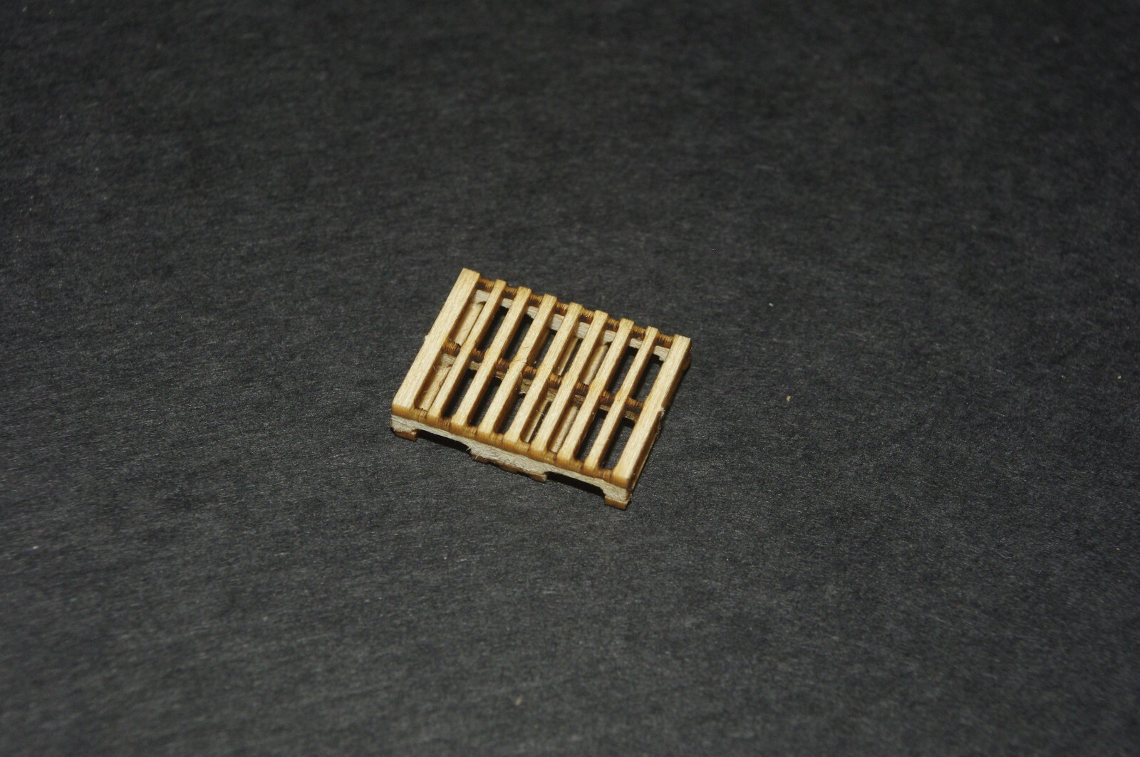 S scale laser cut pallet kit, makes 16 wood pallets once built.