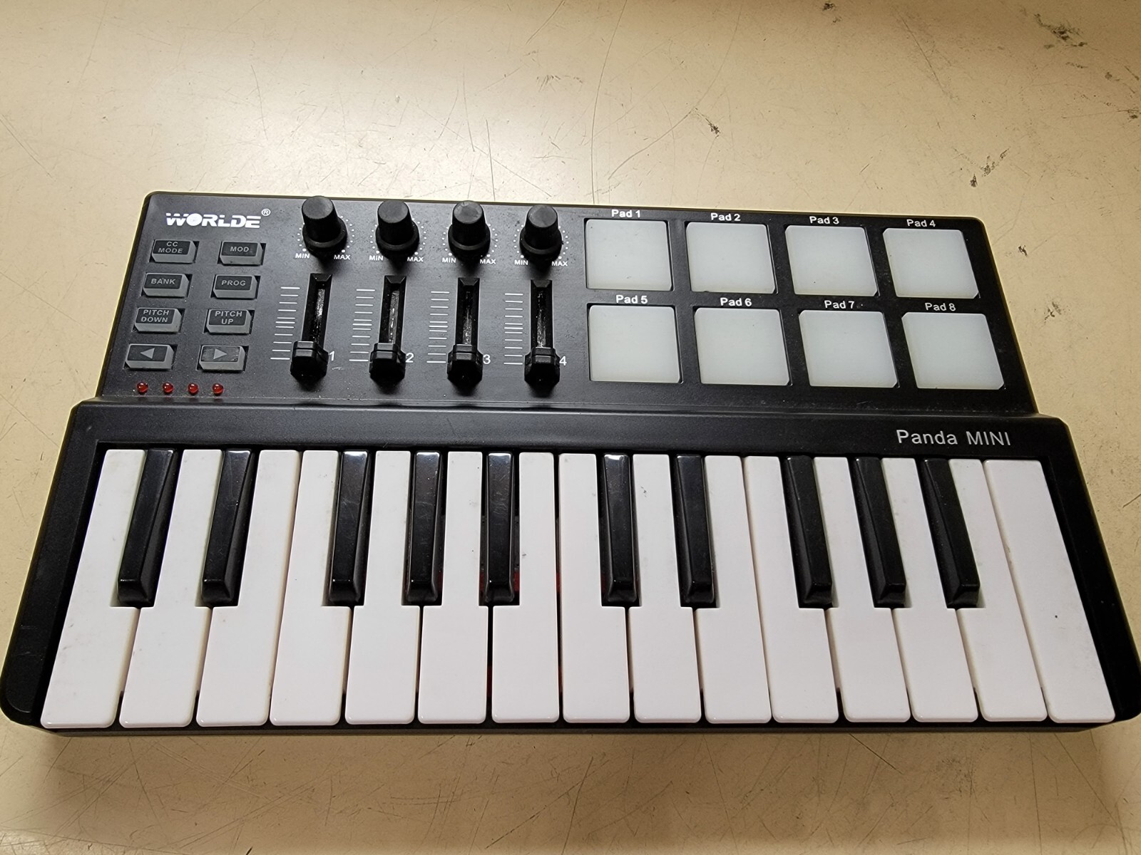 Worlde Panda Mini 25-Key USB Keyboard Drum Pad MIDI Electric Controller