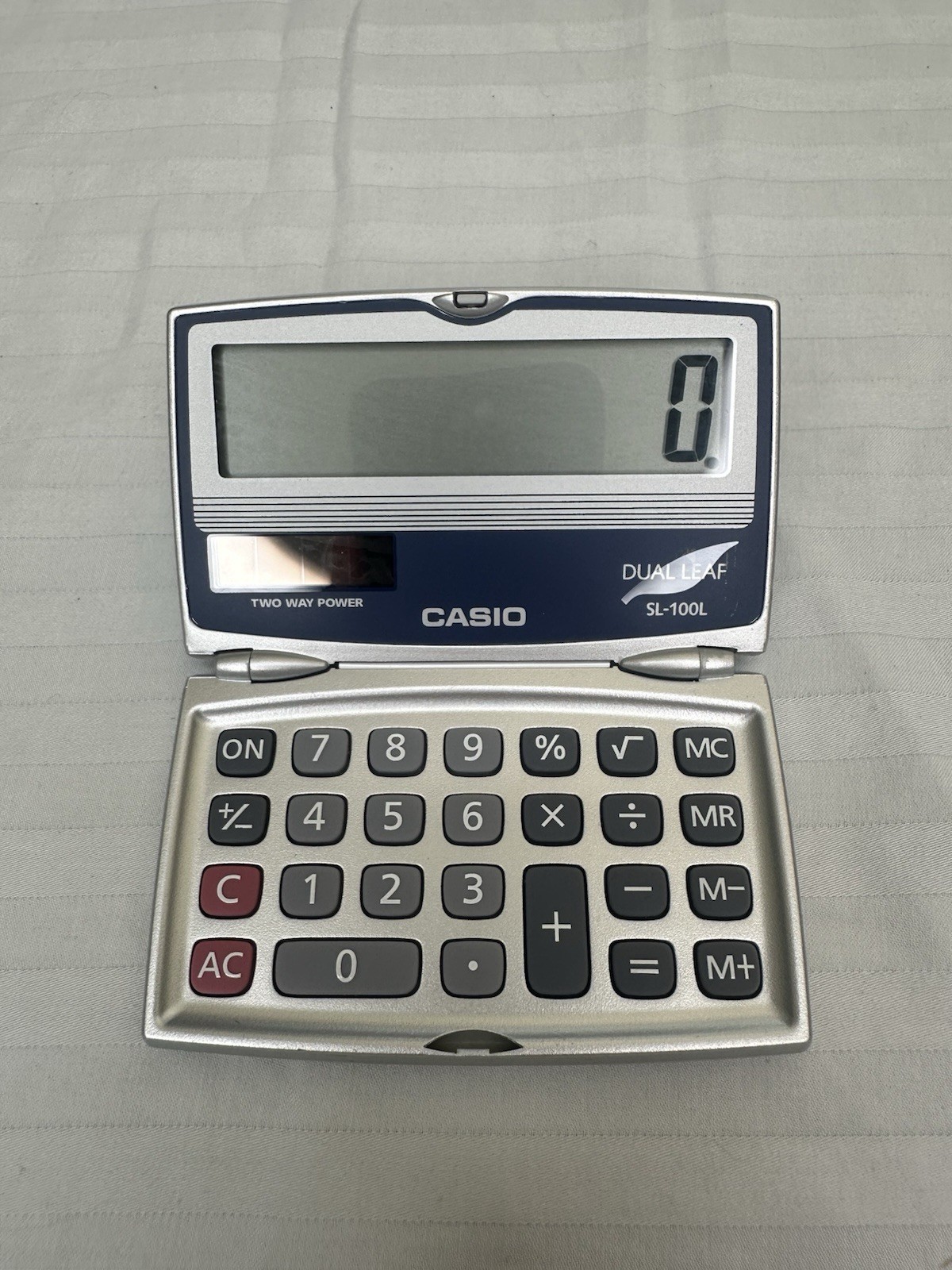 CASIO SL-100L BASIC SOLAR FOLDING COMPACT CALCULATOR