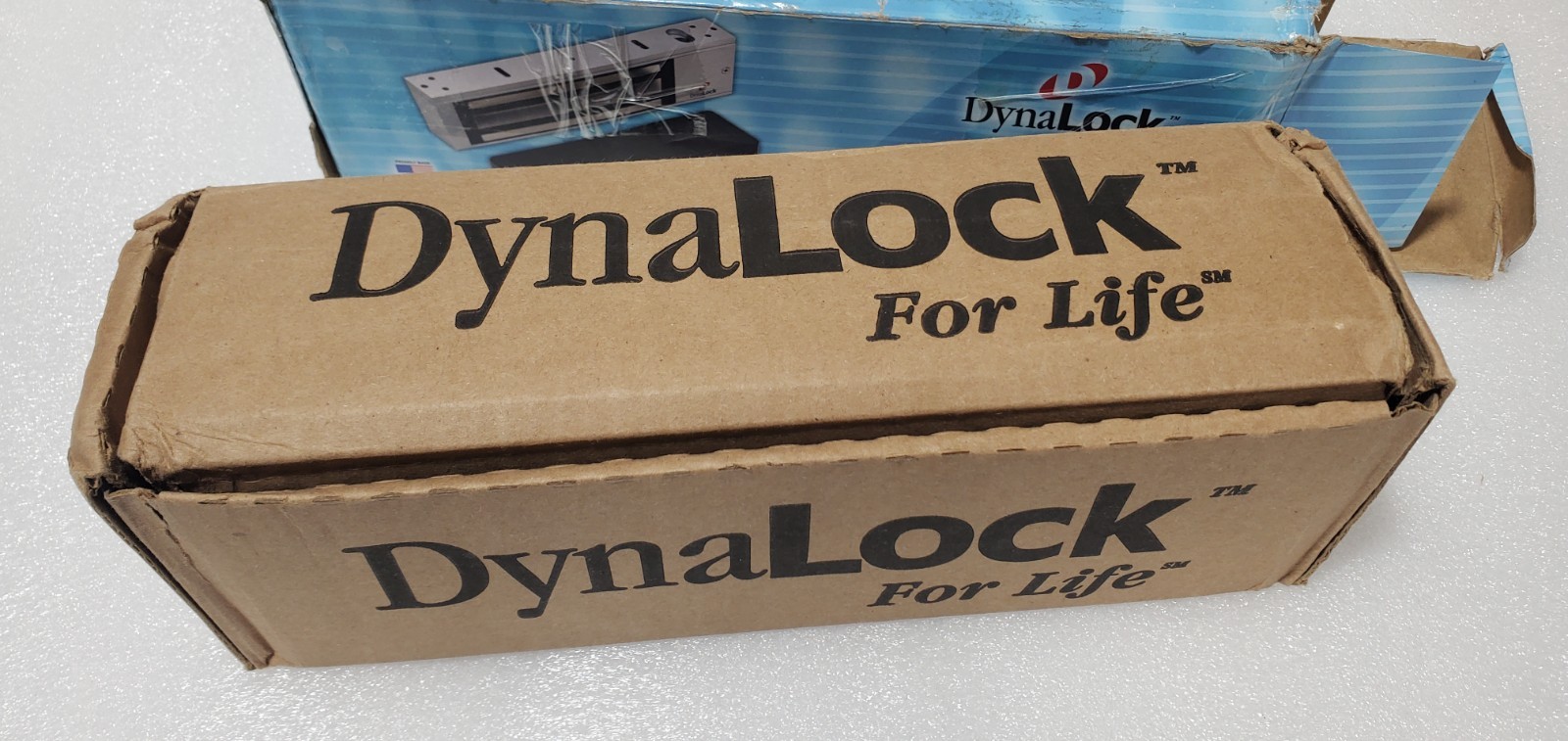DynaLock 2011-US28-DSM Surface Mount Electromagnetic Lock 1200 LBS 12/24V NEW.