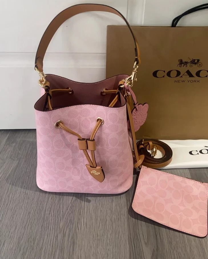 Coach CEA23 Rowan Bucket Bag In Signature Canvas With Charms Powder Pink Outlet+