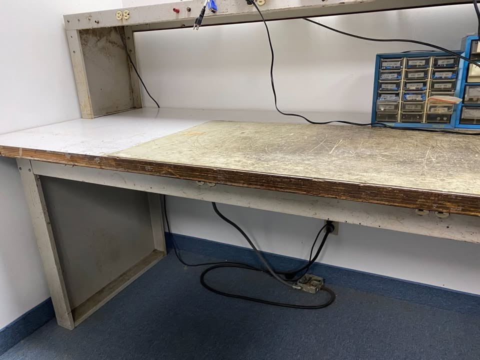 8 foot very heavy duty work bench with matching shelf both powered Local Pickup