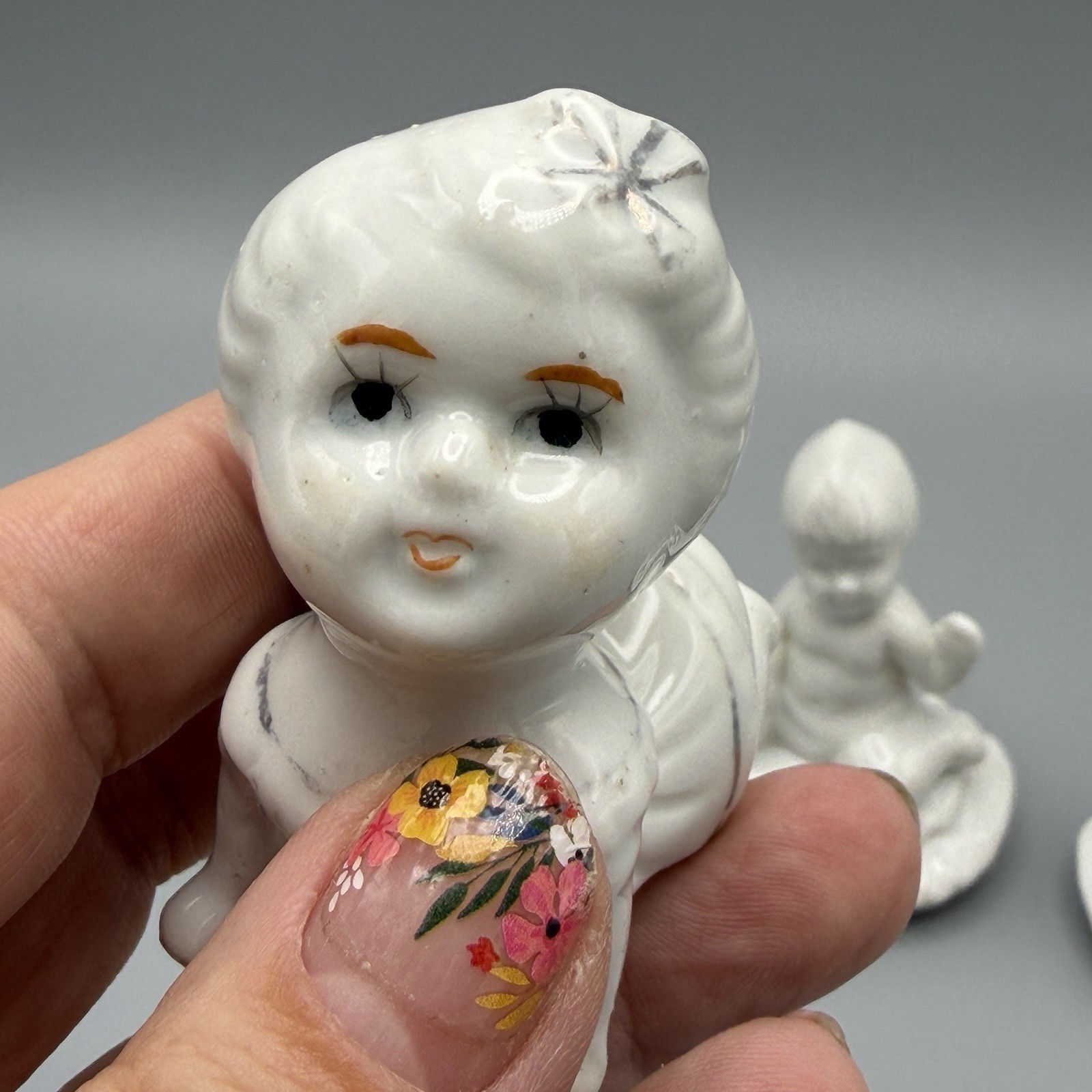 Vintage little Baby Crawling Figurine Gold gilt trim lining Cute 1950’s 2”