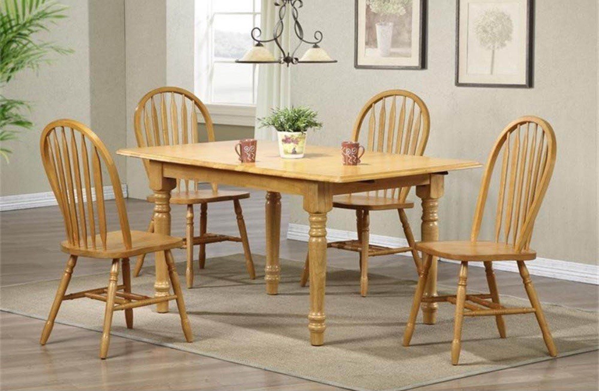 Solid Oak dining room table  60”x35” and 4 chairs