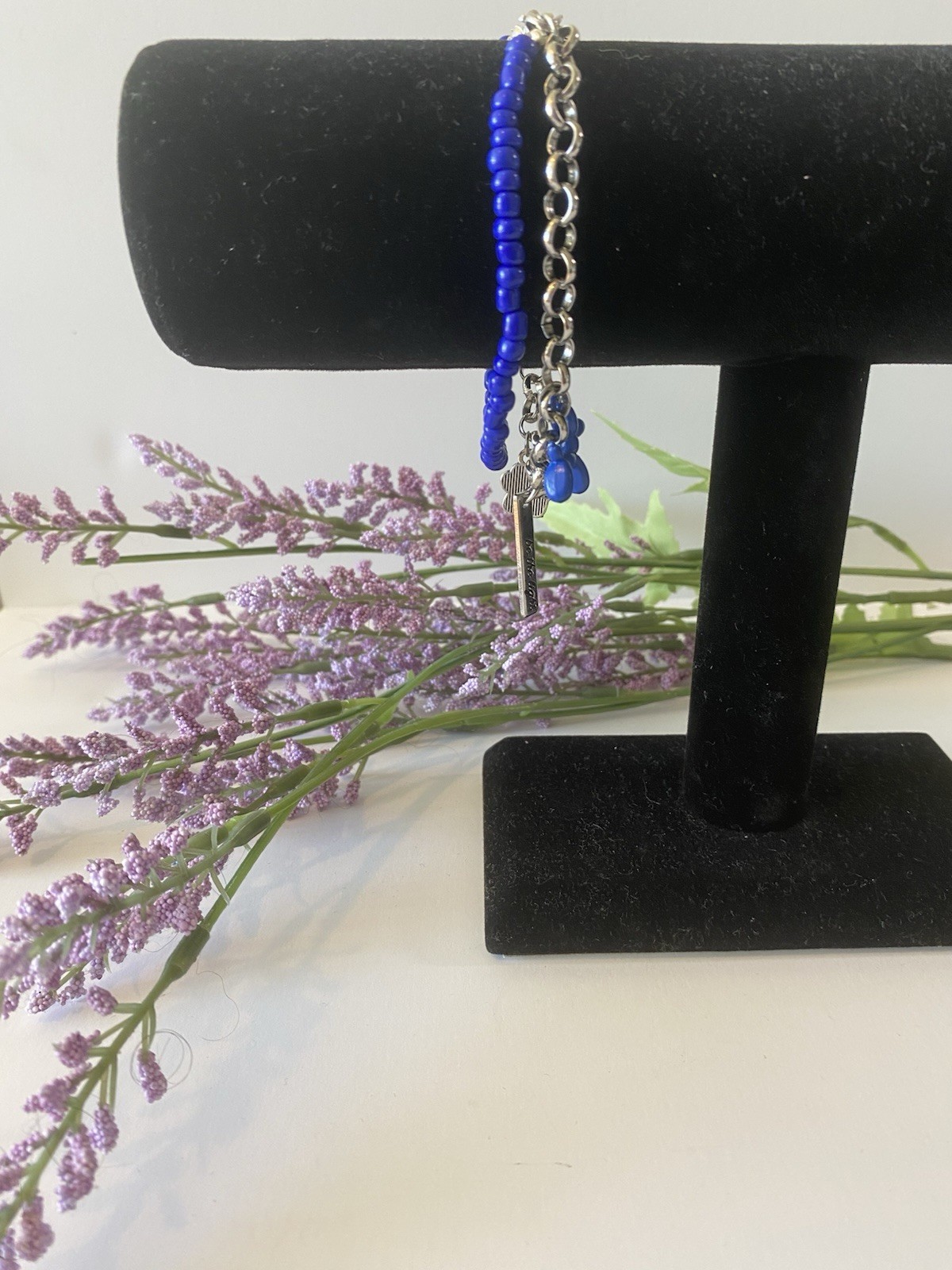 Layered Silver Chain And Blue Beaded Bracelet With Dog Theme