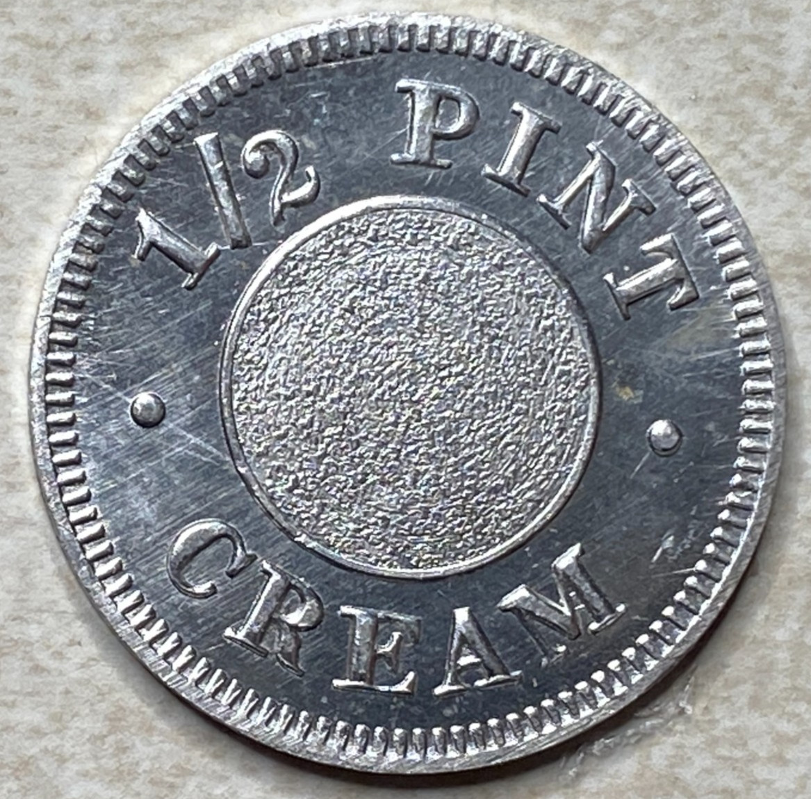 T9270 1/2 Pint Cream, Unknown  Anillo Restrike Arcade Token