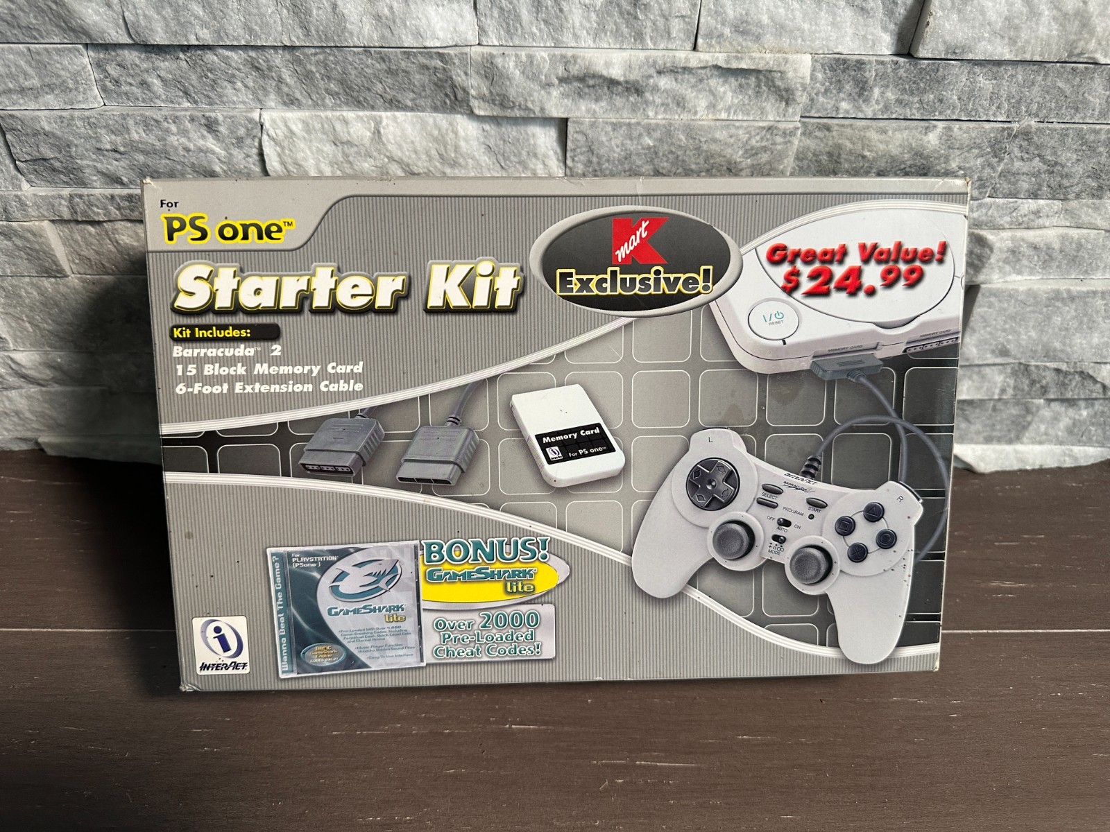 Vintage PS One Starter Kit includes controller and Game Shark lite game disc