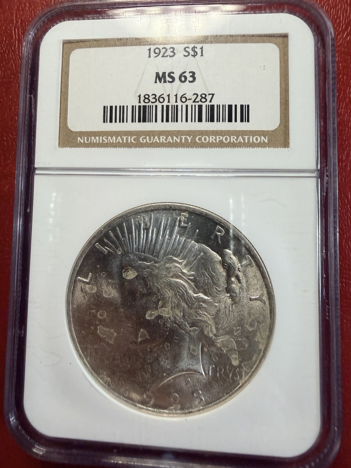 1923 $1 Peace Dollar. NGC MS-63. Free Shipping