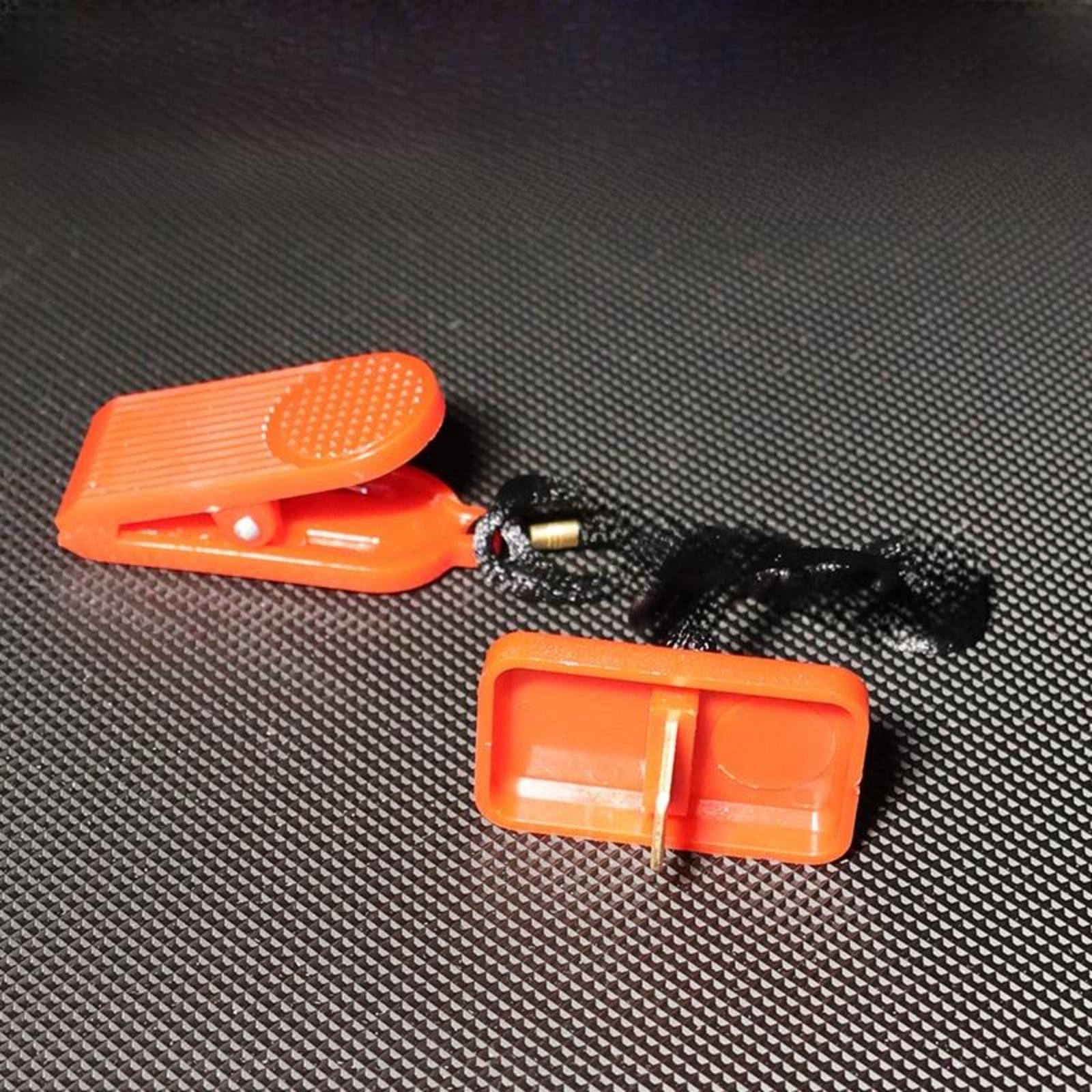 Universal treadmill emergency stop key with copper insert