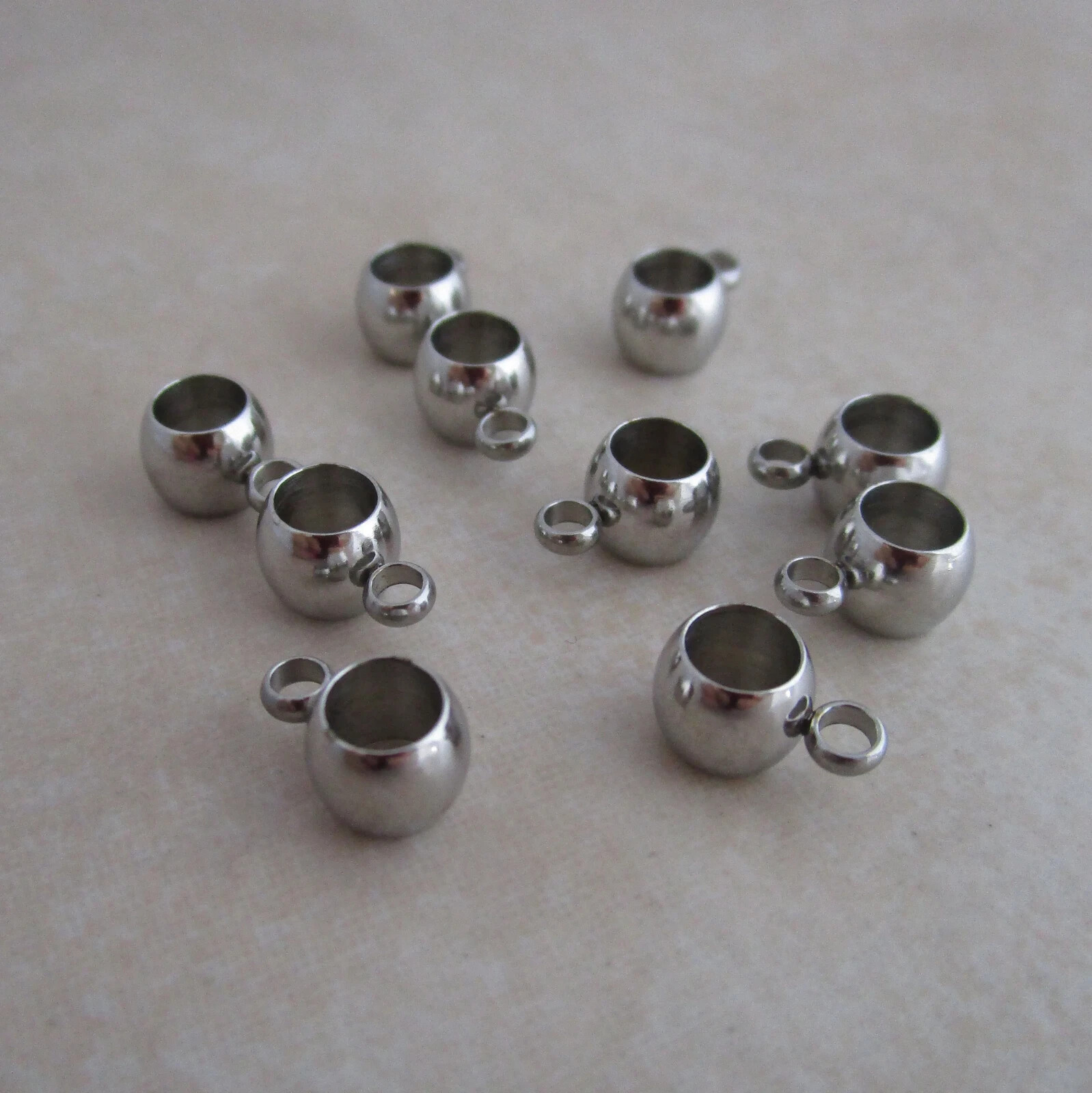 12 stainless steel bead bail hangers 6mm long x 5mm wide