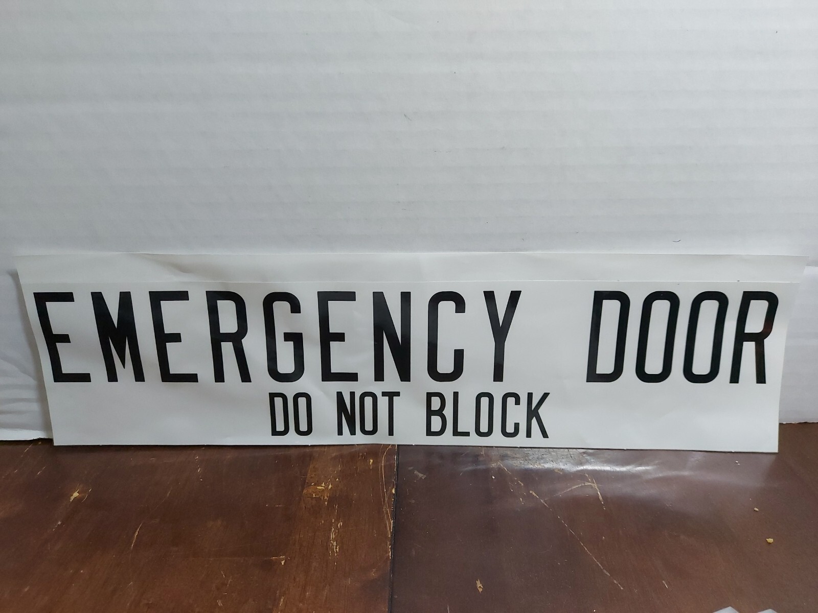 NOS International 2241021C1 EMERGENCY DOOR NOT BLOCK Sign  15 1/2" X 3 3/4"