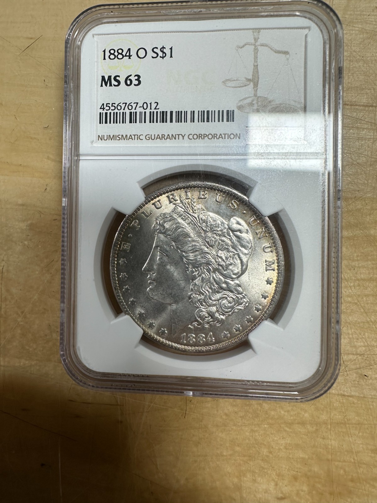 1884-O Morgan Silver Dollar MS63 NGC Toning