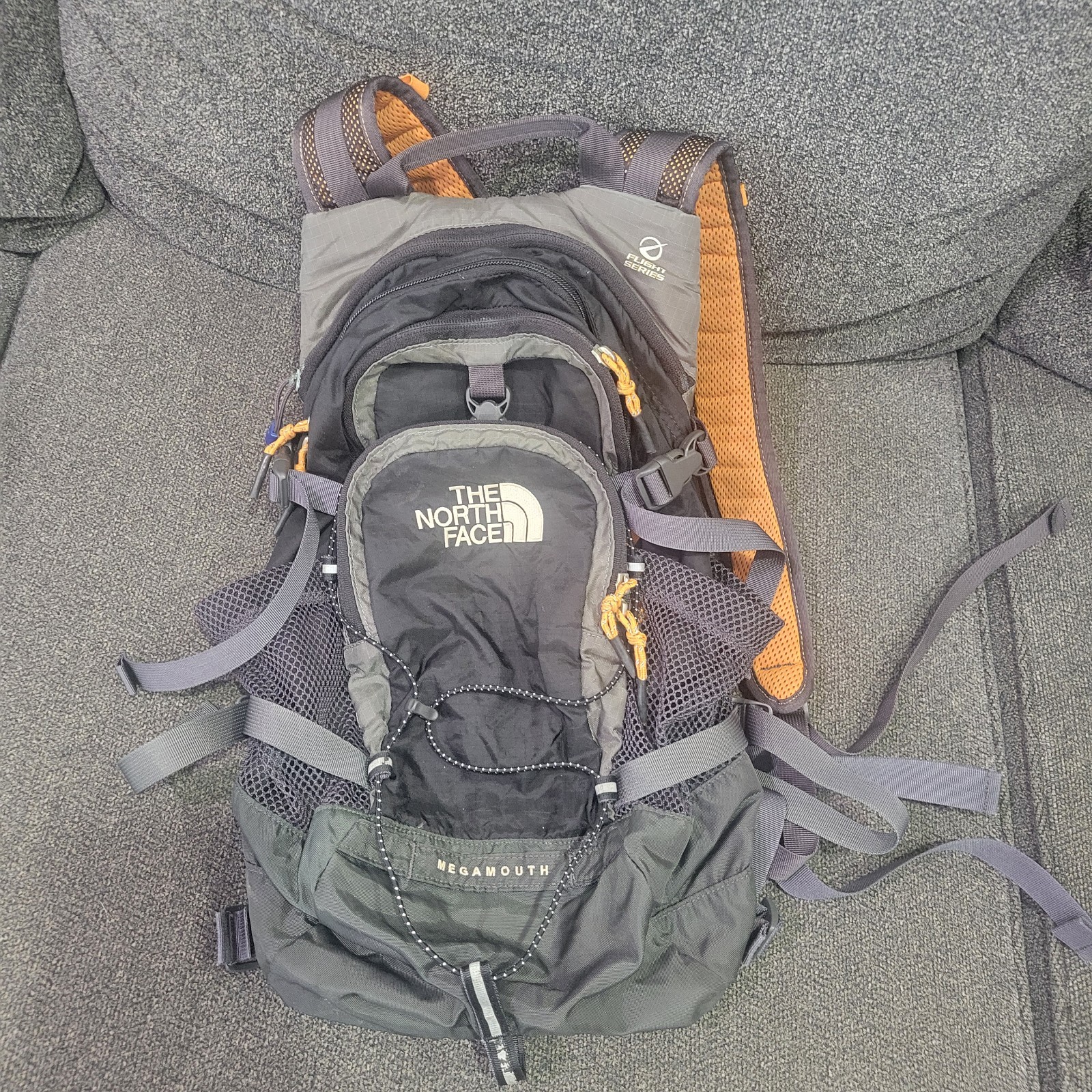 The North Face Megamouth Flight Series Backpack 18L Black/Orange