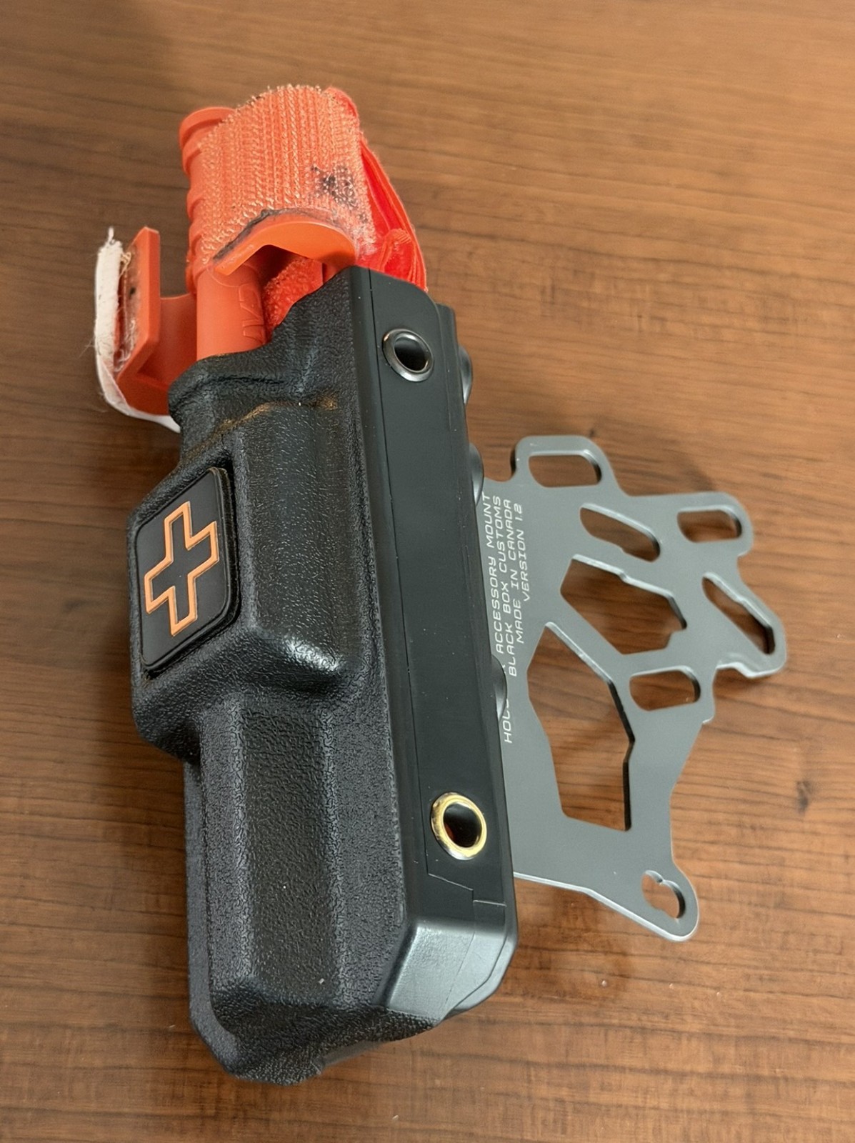 Eleven 10 RIGID Tourniquet Case with Orange TQ & Pistol Holster Mount for Police